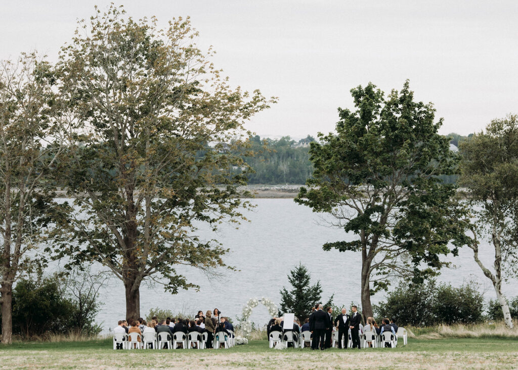 a wedding ceremony is set-up overlooking the ocean in St. Andrews New Brunswick